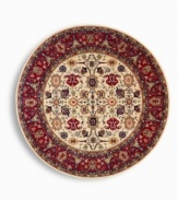 Patterned on an antique Mahal carpet design, this round rug showcases the intricate beauty of flowers, leaves, vines, vases and palmettes on a soft ivory ground. A special dyeing process imparts rich, subtle gradations to a color palette that includes ivory, caramel, terra cotta, blues and soft greens. Woven in the USA of New Zealand premium worsted wool for indulgent softness.