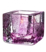 Combining the distinct features of brick and the transparency of glass, this Kosta Boda votive holder adds a fun pop of color and shine to modern spaces. Designed by Anna Ehrner.