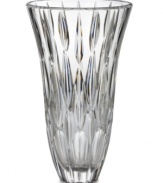 A pattern of raindrops suspended in this exquisite crystal vase creates an always-sunny arrangement. The gently flared rim and substantial weight combine in a sparkling example of enduring grace and quality.