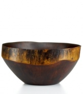 Naturally brilliant. Large but surprisingly light, the Einstein Rustic serving bowl is named for the artist and hand-carved from the trunk of a fast-growing, renewable obeche tree found in Haiti's gorgeous mountainsides. With a lacquer finish to handle hot and cold foods. From Heart of Haiti's collection of serveware and serving dishes.