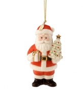 Santa Claus graces your tree with one of his own in this festive annual ornament from Lenox. With gold accents and 2011 charm to mark the season.