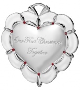 With all your heart. Have a romantic holiday with an engraved Waterford ornament commemorating your first Christmas together. Featuring polished silver plate with sparkling ruby-red accents.
