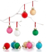 Small but mighty festive, these Martha Stewart Collection mini ornaments mix classic Christmas red and green with cheery candy colors. With a sugary white sparkle for extra fun. (Clearance)
