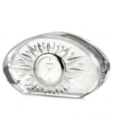 Wedge cuts fanning out around an elegant dial give the Sheridan Flared clock a look of radiant splendor. With silvertone metal accents and a clean, elliptical shape in Marquis by Waterford crystal.