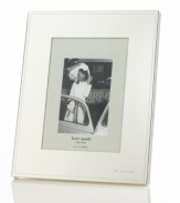 Polished to a lustrous mirror-like finish, this elegant and simple frame is crafted in silver-plated metal, making your most magical moments shine even more. With Mr. & Mrs. engraved in the bottom right corner.