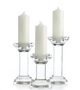 Towers of sleek, faceted crystal, Metropolitan pillar candle holders take modern decor to dazzling new heights. A beautiful gift for newlyweds!