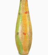 Haitian artist Yvette turns discarded paper bags into a thing of beauty, sculpting and painting this most ordinary material into the beautiful Oval vase. Tall and sleek with spots of green, brown and yellow, it's ideal for long stems of dried flowers or fall branches.