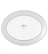 Velvet skies filled with glittering stars. The cacophony of crickets, your very own symphony. The whimsical pattern of dragonflies and ladybugs decorating the June Lane oval platter (shown back) makes dinner at eight a magical experience. Shown back center.