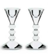 The timeless appeal of crystal for modern aesthetics. A deep beveled stem balances the dramatic symmetry of the cone-shaped top and bottom.