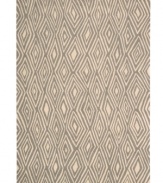 Diamond cut. A distinctive all-over diamond design and charcoal gray background evoke the rings from the trunk of an ancient tree. Hand tufted from 100% natural wool, this plush Calvin Klein rug is crafted using the cut-and-loop pile technique that creates a unique matte surface texture.