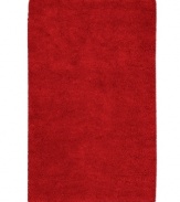 Red alert. A vivid hue makes a bold statement in any space, punctuating your decor in striking style. Hand-woven in India, this plush area rug from Surya is luxuriously rendered in indulgently soft New Zealand felted wool.