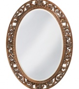 Open scrolling vines and narrow cording wind around this fabulously old-fashioned oval mirror. With an antique bronze finish, this elegant piece is a noble throwback to stylish ages past.