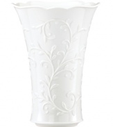 Featuring the embossed vine motif and shiny white glaze of the Opal Innocence Carved collection, this Lenox vase is designed to refine your home indefinitely. With a gently flared silhouette and scalloped edge. A beautiful wedding present! Qualifies for Rebate