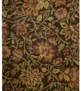 Luminous desert blossoms cascade across a chocolate ground in the Rajah area rug from Nourison, creating a warm and inviting update made for any style decor. Crafted in India of sumptuous New Zealand wool pile for incredible color-recognition, design clarity and a luxuriously soft feel.