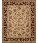 A deep maroon border offers a refreshing pop of color on this sophisticated area rug. Meticulously handcrafted with soft wool pile, and highlighted with lustrous silk accents, this elegant addition to the Nourison 2000 collection lends a fashionable look to both casual and refined spaces.
