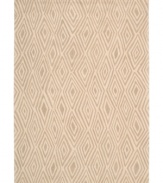 Diamond cut. A distinctive all-over diamond design and soft beige background evoke the rings from the trunk of an ancient tree. Hand tufted from 100% natural wool, this plush Calvin Klein area rug is crafted using the cut-and-loop pile technique that creates a unique matte surface texture.