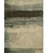Abstract and dramatic, this handcrafted wool rug features a rich spectrum of shades from sky tones to deep smoke. The ethereal coloration pattern is reminiscent of a soothing lake set in watercolors. An exclusive luster-wash finish gives the rug a beautiful, subtle finish.