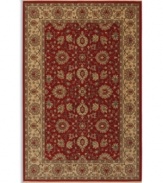 This Karastan rug takes classic elements from the Orient and updates them in an American palette, featuring a lush vine and palmette border pattern against a vivid red ground. Made from 100% premium worsted 3-ply wool for a soft hand and long-lasting wear.