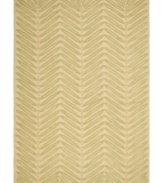 A herringbone pattern of leaves creates a fresh look for the modern home in this unique area rug from Martha Stewart rugs. Hand tufted in India of long wool fibers, this luxurious home accent presents unparalleled comfort and style underfoot.