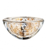 As good as gold, the Glimmer bowl radiates holiday fun but dazzles all year long in heavy, shimmering crystal. By Anna Ehrner for Kosta Boda.