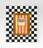 Display your treasured moments in this opulent, hand-painted frame with gilt inner molding.Hand-painted checks on enameled steelGlassAccommodates a 5 X 7 photographOverall, 11 X 13Linen-covered easel and backImported