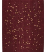 The Chambord Collection from Nourison combines classic French design with a textural density and delicate patterns boasting a silk-like sheen and natural cotton fiber. Hand-carved velvety nap brings the epitome of Old World elegance to your home with a charming design of delicate branches filled with flowering buds in soft taupe against a rich burgundy ground.