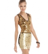 XOXO's dress sparkles the night away! Wear it with high heels to increase the impact.