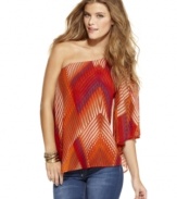 Bold print plus a stunning asymmetrical sleeve make this top from Jessica Simpson the one to beat! Rock it with a stack of fab accessories for a night look that's appropriately chic!