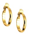 More to love. This pair of medium-width hoop earrings from Anne Klein is crafted from gold-tone mixed metal and features glass accents for added shine. Approximate diameter: 1-3/4 inches.