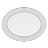 At once formal and festive, the Pearl Beads oval platter sets a celebratory tone in fine bone china wrapped in bands of shimmering platinum. Swirling white dots adds a sense of playfulness to an elegant Lenox dinnerware collection. Qualifies for Rebate
