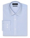 Dress shirt with spread collar, two button barrel cuffs and a slimmer fit through the body, with an allover blue stripe pattern.