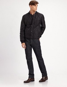 A classic fit in clean, dark-washed core denim with a hint of stretch and a metal logo plate on the back. Five-pocket style Inseam, about 32 99% cotton/1% elastene Machine wash Imported 