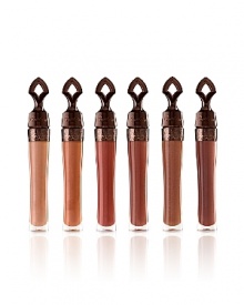 Guerlain's lipgloss is light and creamy, melt-away and comfortable, delicious and not sticky; truly the ideal texture for summer lips. At the heart of this comforting formula, Marula oil moisturizes and regenerates, while the antioxidant complex and SPF 15 protection index shield the lips. Terracotta Gloss colours are specially developed to enhance, revive and revitalize a tan, while providing warmth and light. This concentrate of sparkle and radiance creates a smile that seems warmed by a ray of sunlight to compliment a glowing tan. Its unprecedented ergonomic applicator transforms each application into a true moment of pleasure.