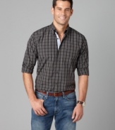 Crafted in a crisp, clean plaid, this lightweight shirt from Tommy Hilfiger will easily become a casual must-have.