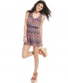 Bold print wins big on a couture-inspired romper from Fire that's perfectly suited for a day in the sun!