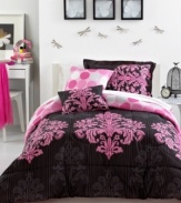 Turn up the pink! The perfect balance of dramatic and whimsical, this Matador comforter set boasts a tonal stripe design embellished with pink medallion designs. Reverses to a pink dot pattern.