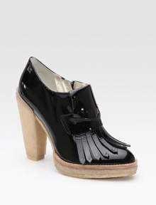 Glossy patent-leather look defined by a moccasin-inspired front and wide rubber heel. Rubber heel, 4½ (115mm) Rubber platform, ¾ (20mm) Compares to a 3¾ heel (95mm) Shaft, 3½ Patent leather upper Leather lining Rubber sole Padded insole ImportedOUR FIT MODEL RECOMMENDS ordering true size. 