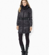 Designed with a modern stowaway hood for added protection, Lauren Ralph Lauren's chic quilted jacket is belted at the waist for a flattering fit.