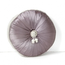 Boasting a classically opulent shape in finely pleated purple silk, this Waterford decorative pillow boasts fine twisted cord detailing and center acorn tassels.