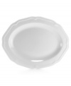A large elegant way to serve a main course, this gracefully shaped platter from Mikasa's Antique White dinnerware and dishes collection has a soft geometric feel and clean, embossed design.