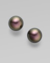 Modern yet classic, iridescent Tahitian pearls to wear everywhere. 12MM Tahitian pearls Sterling silver post back Made in Spain 