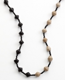 Old news is good news. Heart of Haiti artisans create this one-of-a-kind necklace from recycled newspaper, hand-rolling tiny strips into beads that are then sealed with clear polish and strung together to make a bold statement. Old news is good news. Heart of Haiti artisans create this one-of-a-kind necklace from recycled newspaper, hand-rolling tiny strips into beads that are then sealed with clear polish and strung together to make a bold statement.