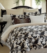 Turn your bedroom into an exotic getaway with this Tommy Bahama Home Julie Cay comforter set. A bounty of floral details take center stage over a dark landscape, evoking the warmth of an evening in the Caribbean.