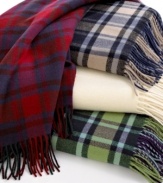 Classic comfort. Wrap yourself in the pure luxury and warmth of this throw from Pendleton, featuring plush wool fabric and your choice of either plaid or solid colors.