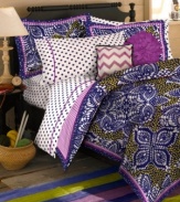 Pair your Samara Batik comforter set from Teen Vogue with this whimsical sheet set, featuring large-scale polka dots in coordinating white and purple hues.