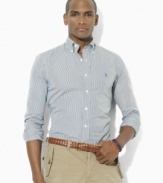A polished bengal stripe motif adds timeless style to a trim-fitting sport shirt in crisp cotton poplin.
