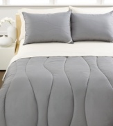 In true Calvin Klein style, this Random Wave comforter offers a sophisticated look for your room while maintaining a comfy and cozy feel for a restful night's sleep. Features a quilted wave pattern, hypoallergenic construction and the Calvin Klein signature linen label. Comes in three modern hues.