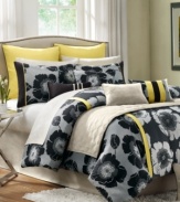 Thoroughly modern, bold blooms and polka dots in a chic black and white color scheme intertwine in this Jolee comforter set. Decorative pillows and shams draw in pops of yellow for a touch of brightness, while coordinating coverlet offers a light layering option.