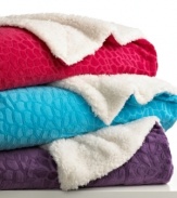 Comfort zone. Lounge around with the soft texture and chic style of these throws from Teen Vogue, featuring an embossed crocodile pattern and a variety of bright colors. Reverses to sherpa. Coordinate with the matching pillows.