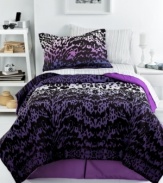 Into the jungle! A frenzy of pattern greets your room in this Ombre Animal comforter set, featuring an allover cheetah print in a rich purple and black colorway.